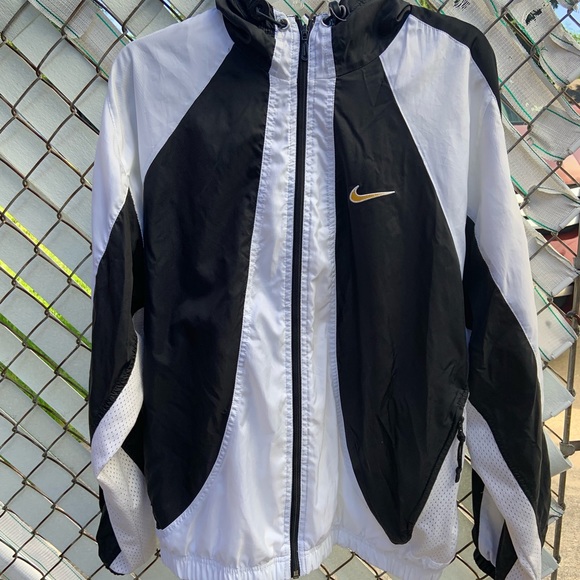 nike black and gold windbreaker